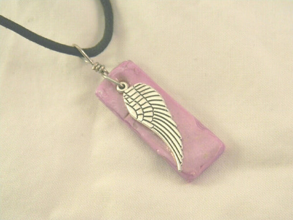 Polymer clay and silver wing charm necklace